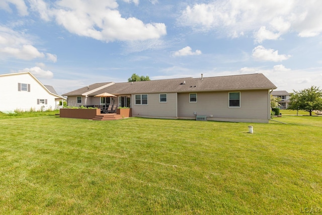 3564 Sapphire Dr, Adrian, MI 49221 - rear view of property featuring a deck and a lawn