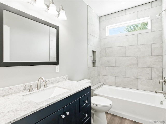 9711 Crawford, Columbus, MI 48063 - full bathroom featuring vanity, wood finished floors, and  shower combination