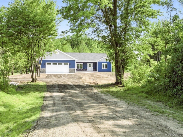 9711 Crawford, Columbus, MI 48063 - single story home with driveway, stone siding, and a garage