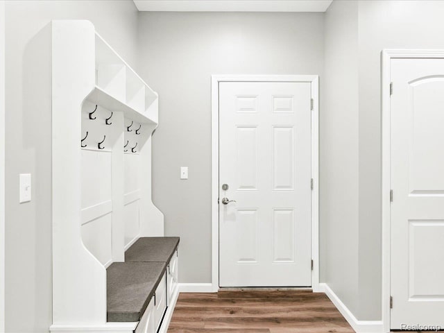 9711 Crawford, Columbus, MI 48063 - mudroom featuring dark wood-type flooring and baseboards