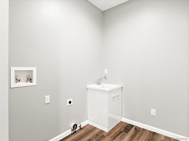 9711 Crawford, Columbus, MI 48063 - washroom with electric dryer hookup, hookup for a washing machine, and wood finished floors