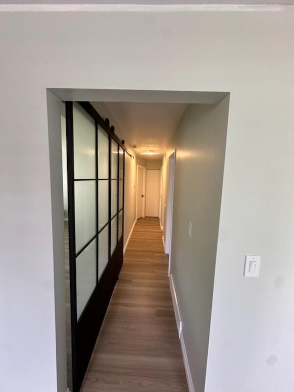 3550 Burns St, Inkster, MI 48141 - hall featuring baseboards and dark wood-style flooring