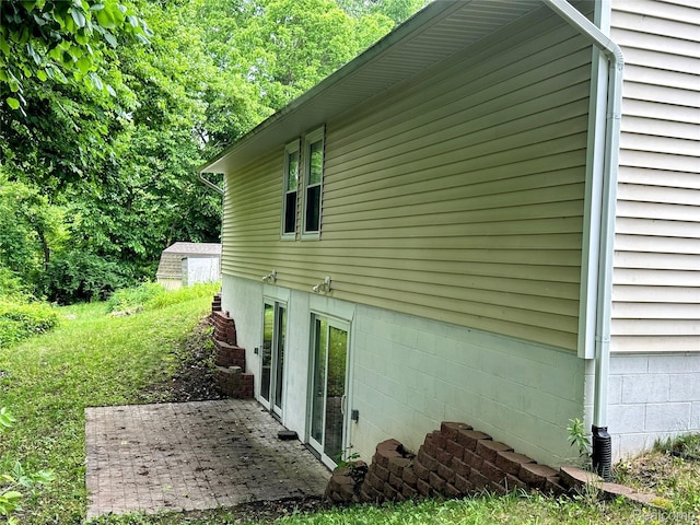 7841 Horseshoe Creek Ct, Whitmore Lake, MI 48189 - view of home's exterior with a patio