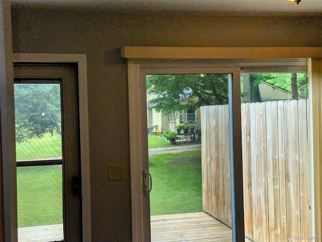 7841 Horseshoe Creek Ct, Whitmore Lake, MI 48189 - doorway to outside featuring wood finished floors