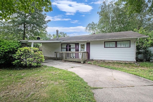 1538 Sheridan Ave, Niles, MI 49120 - ranch-style home featuring concrete driveway, a carport, and a front lawn