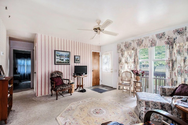 1538 Sheridan Ave, Niles, MI 49120 - carpeted living area with wallpapered walls and a ceiling fan