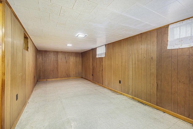 1507 Annie Ave NW, Grand Rapids, MI 49504 - below grade area with light flooring, wood walls, and healthy amount of natural light