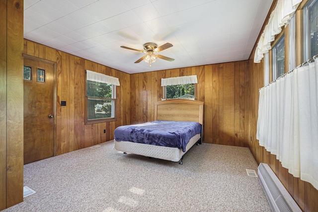 1507 Annie Ave NW, Grand Rapids, MI 49504 - bedroom featuring wood walls, carpet floors, and ceiling fan