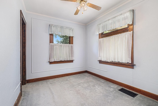 1507 Annie Ave NW, Grand Rapids, MI 49504 - empty room featuring ornamental molding, carpet floors, and ceiling fan