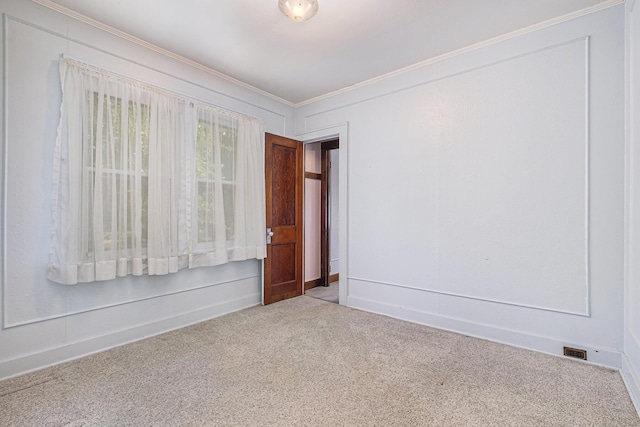 1507 Annie Ave NW, Grand Rapids, MI 49504 - carpeted spare room with crown molding
