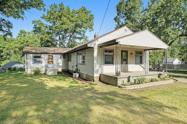 1507 Annie Ave NW, Grand Rapids, MI 49504 - view of front of home with a front lawn and a porch