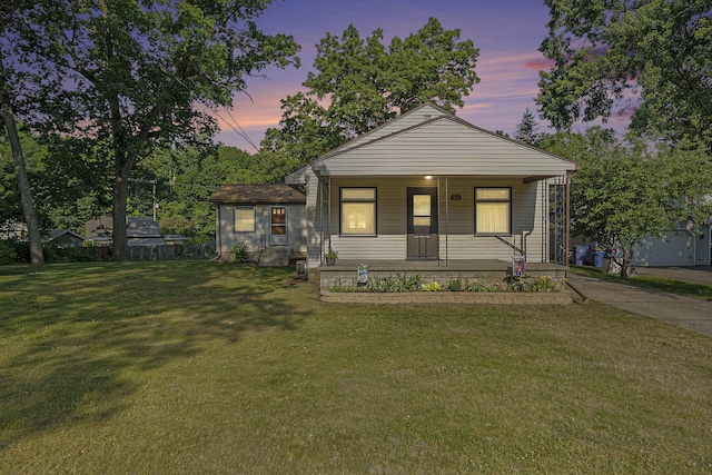 1507 Annie Ave NW, Grand Rapids, MI 49504 - bungalow with covered porch and a yard