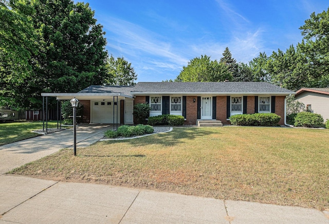 1136 3 Mile Rd NW, Grand Rapids, MI 49544 - ranch-style house with brick siding, concrete driveway, a garage, and a front yard