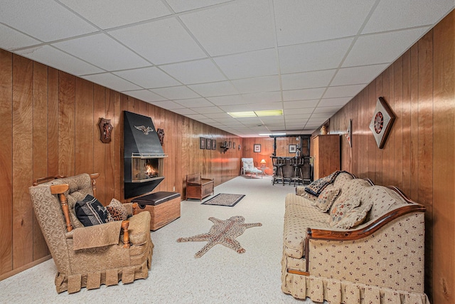 1136 3 Mile Rd NW, Grand Rapids, MI 49544 - living area featuring wooden walls and a paneled ceiling