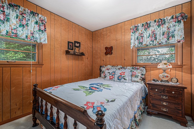 1136 3 Mile Rd NW, Grand Rapids, MI 49544 - carpeted bedroom featuring wooden walls