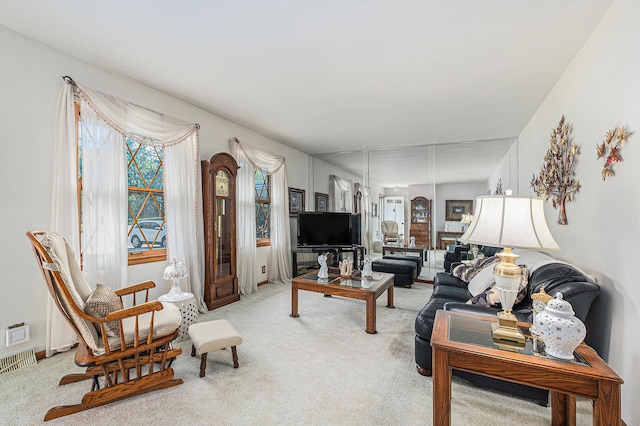 1136 3 Mile Rd NW, Grand Rapids, MI 49544 - living room featuring carpet and healthy amount of natural light