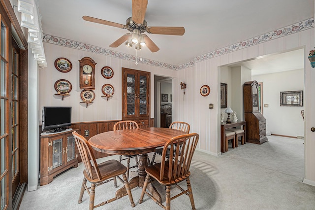 1136 3 Mile Rd NW, Grand Rapids, MI 49544 - dining room with a ceiling fan and light colored carpet