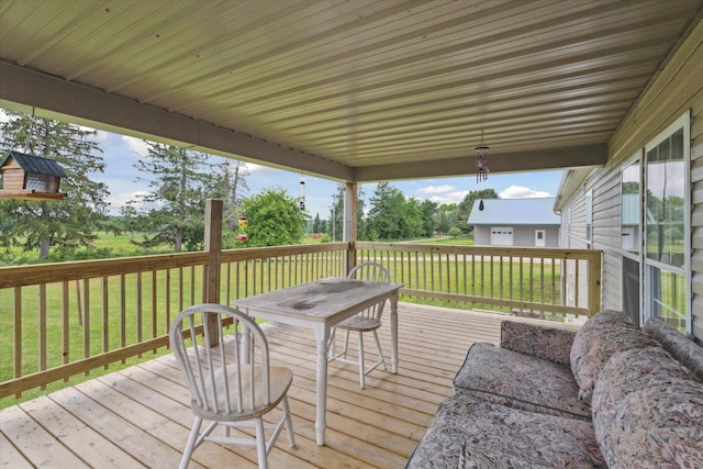 21576 220th Ave, Tustin, MI 49688 - wooden deck featuring a lawn