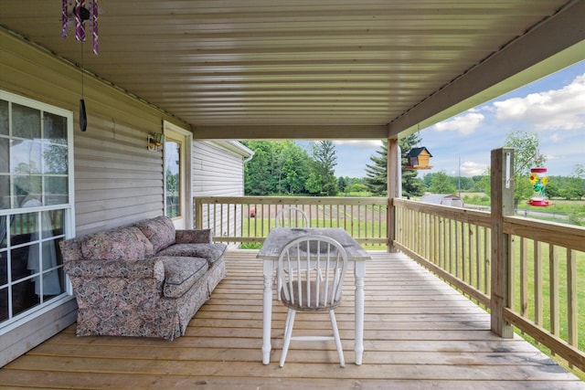 21576 220th Ave, Tustin, MI 49688 - wooden deck featuring an outdoor living space