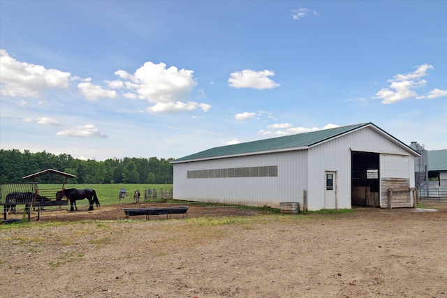 21576 220th Ave, Tustin, MI 49688 - view of pole building featuring an exterior structure