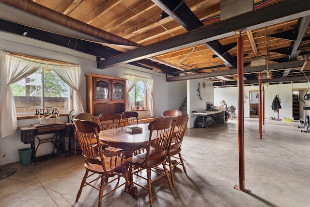 21576 220th Ave, Tustin, MI 49688 - dining room with concrete flooring and stairway
