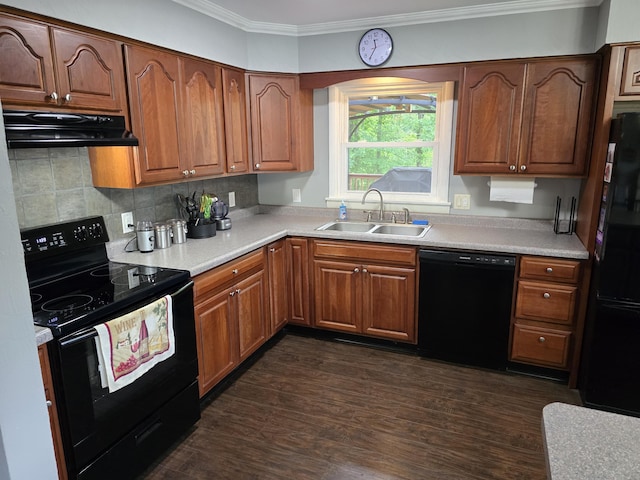 28548 Fairlane Dr, Dowagiac, MI 49047 - kitchen with black appliances, crown molding, range hood, light countertops, and tasteful backsplash