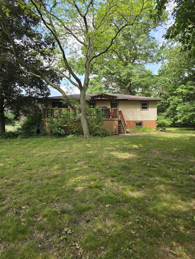 28548 Fairlane Dr, Dowagiac, MI 49047 - view of grassy yard with stairs and a wooden deck