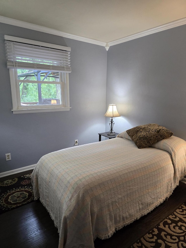 28548 Fairlane Dr, Dowagiac, MI 49047 - bedroom with crown molding and wood finished floors