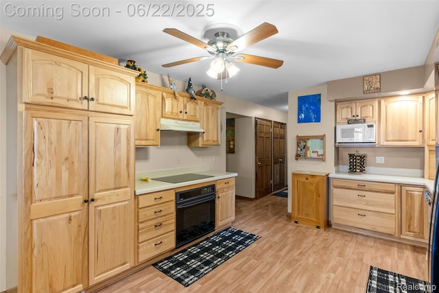 13256 Pine Valley Dr, Clio, MI 48420 - kitchen featuring light brown cabinets, black appliances, under cabinet range hood, and light countertops