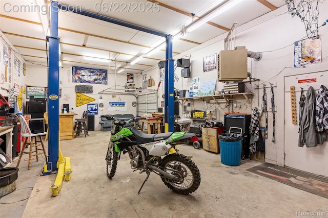 13256 Pine Valley Dr, Clio, MI 48420 - garage featuring a workshop area