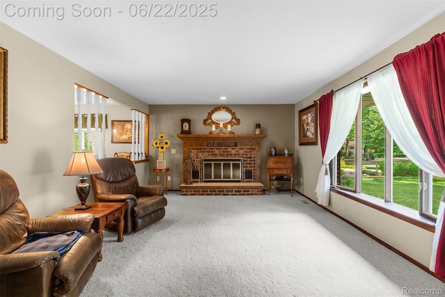 13256 Pine Valley Dr, Clio, MI 48420 - carpeted living area featuring a fireplace and baseboards