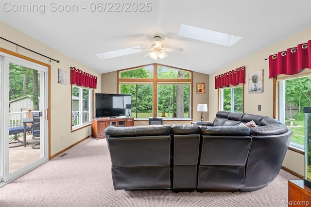 13256 Pine Valley Dr, Clio, MI 48420 - living room with a skylight, ceiling fan, lofted ceiling, carpet floors, and healthy amount of natural light