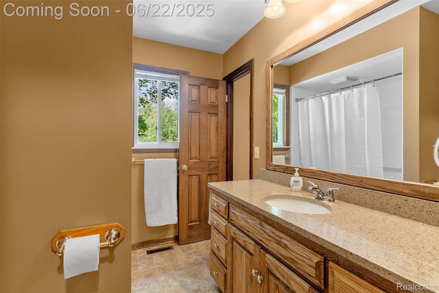 13256 Pine Valley Dr, Clio, MI 48420 - full bath with vanity and stone finish floors