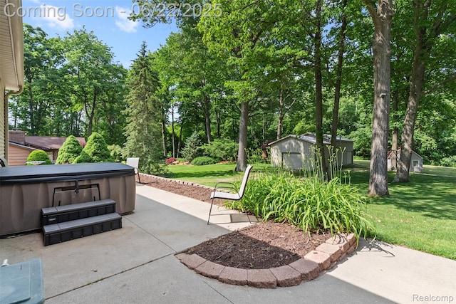 13256 Pine Valley Dr, Clio, MI 48420 - view of patio / terrace with a hot tub, a shed, and view of scattered trees