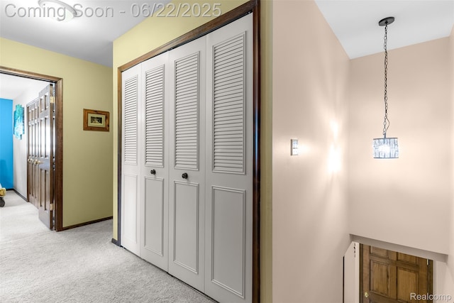 13256 Pine Valley Dr, Clio, MI 48420 - hallway featuring light colored carpet and baseboards