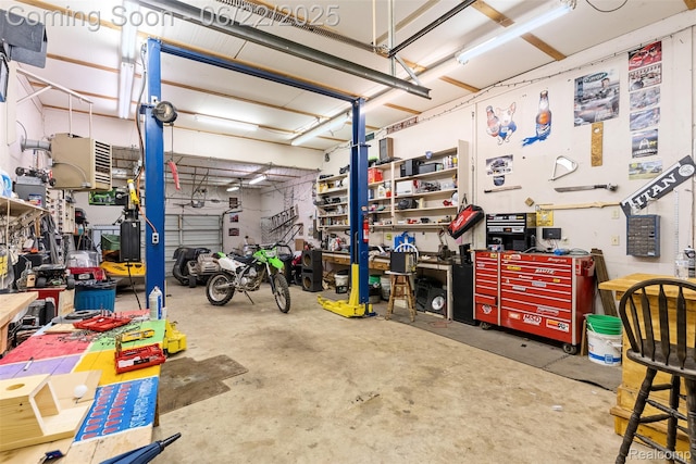 13256 Pine Valley Dr, Clio, MI 48420 - garage featuring a workshop area