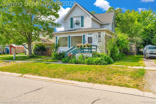 727 Minnie St, Port Huron, MI 48060 - view of front facade with roof with shingles