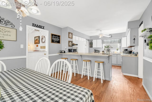 727 Minnie St, Port Huron, MI 48060 - dining room with ceiling fan and light wood finished floors