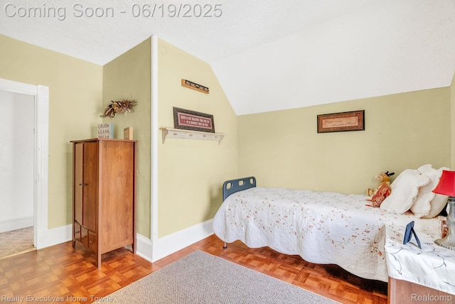 727 Minnie St, Port Huron, MI 48060 - bedroom featuring lofted ceiling and baseboards