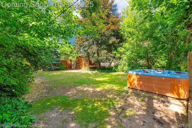 727 Minnie St, Port Huron, MI 48060 - fenced backyard with a hot tub