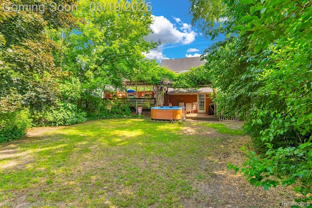 727 Minnie St, Port Huron, MI 48060 - view of green lawn featuring a hot tub