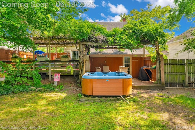 727 Minnie St, Port Huron, MI 48060 - view of yard with a hot tub and a wooden deck