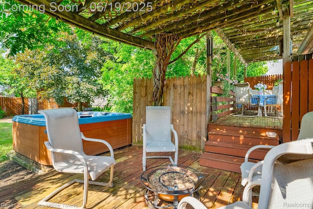 727 Minnie St, Port Huron, MI 48060 - deck featuring a hot tub and an outdoor fire pit