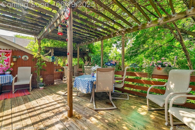 727 Minnie St, Port Huron, MI 48060 - wooden deck with a pergola and outdoor dining space