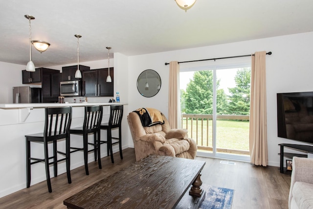 1633 Tea Pond Ct, Vicksburg, MI 49097 - living room with wood finished floors