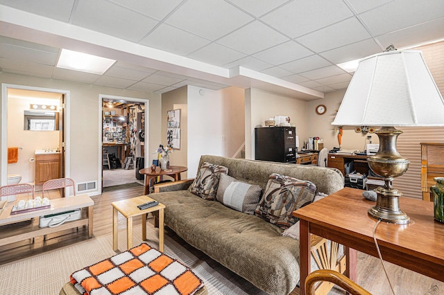2519 Meade Ct, Ann Arbor, MI 48105 - living room with a paneled ceiling and light wood-style floors