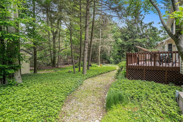 4686 Doug Dr, Whitehall, MI 49461 - view of yard featuring a wooden deck