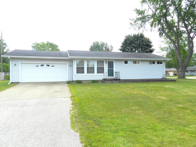 2865 Carrie Ln, Saint Joseph, MI 49085 - ranch-style house with driveway, a garage, a front yard, and a chimney