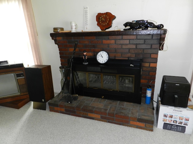 2865 Carrie Ln, Saint Joseph, MI 49085 - detailed view of a brick fireplace and carpet flooring