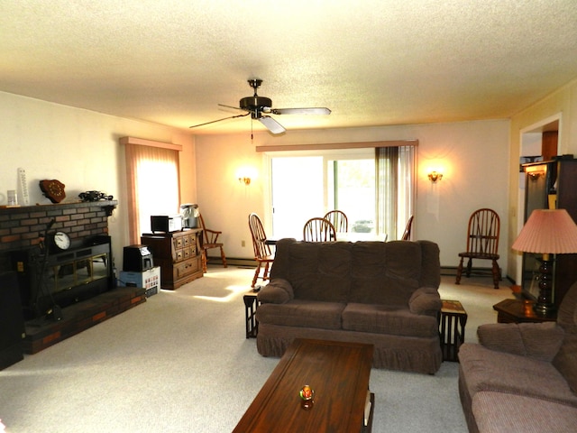2865 Carrie Ln, Saint Joseph, MI 49085 - carpeted living area featuring a textured ceiling, a ceiling fan, a baseboard heating unit, and a brick fireplace